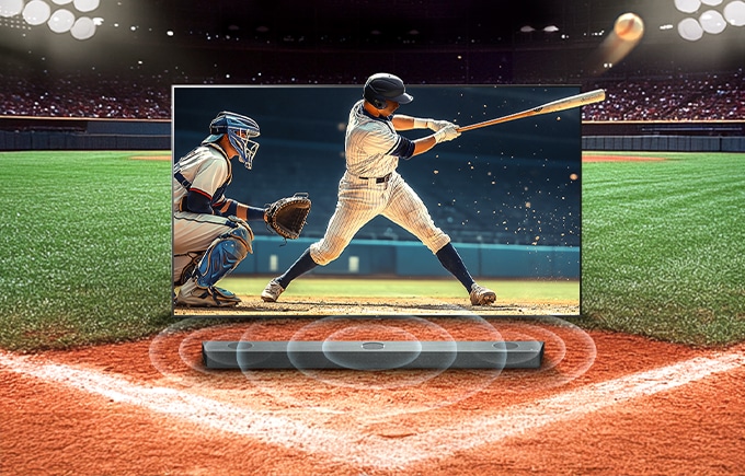 야구장 위에 놓인 TV, 타자가 공을 치는 역동적인 순간과 사운드바의 생생한 음향.